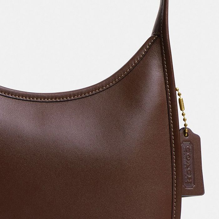 COACH® | Curve Zip Bag