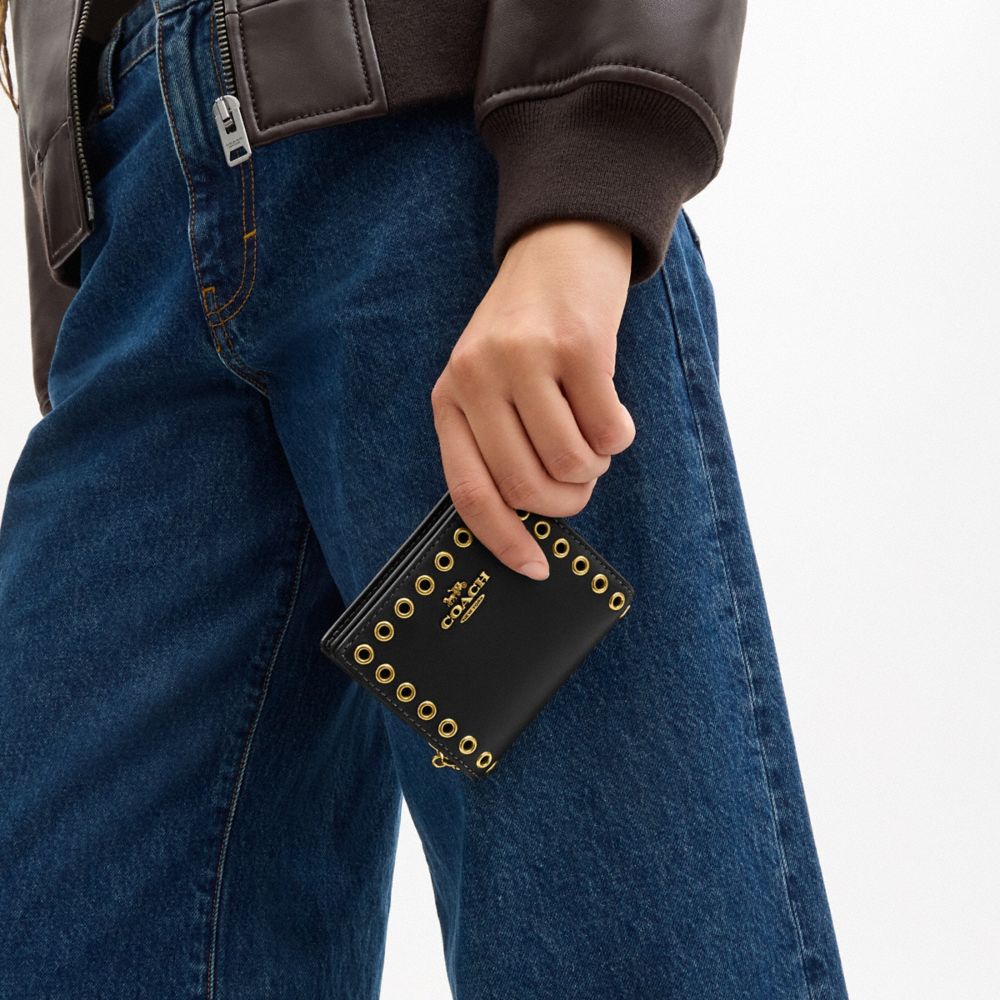 COACH®,Snap Wallet With Grommets,Leather,Bi Fold,Metal,Logo,Grommet,Casual,Black,Detail View