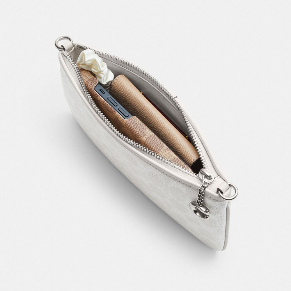 Coach Pouch Bag In Signature Canvas In Silver/white Chalk