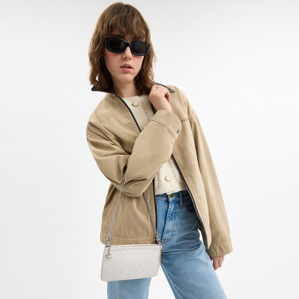 Coach Pouch Bag In Signature Canvas In Silver/white Chalk