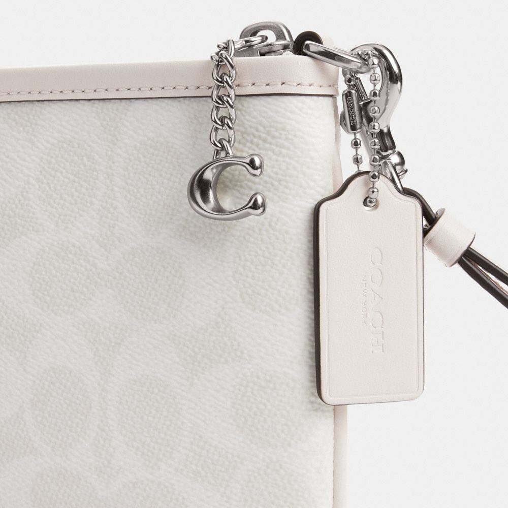 Coach Pouch Bag In Signature Canvas In Silver/white Chalk