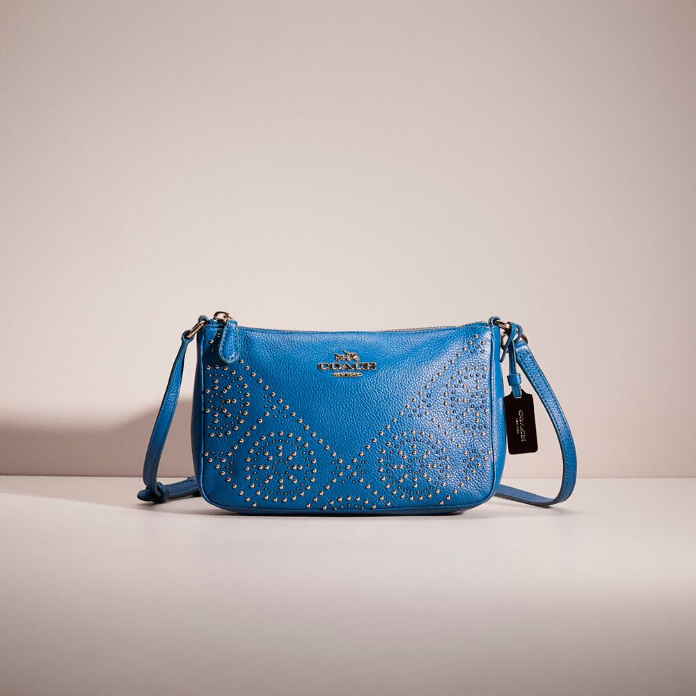 Coach Restored Zip Top Crossbody With Studs In Light Gold/denim