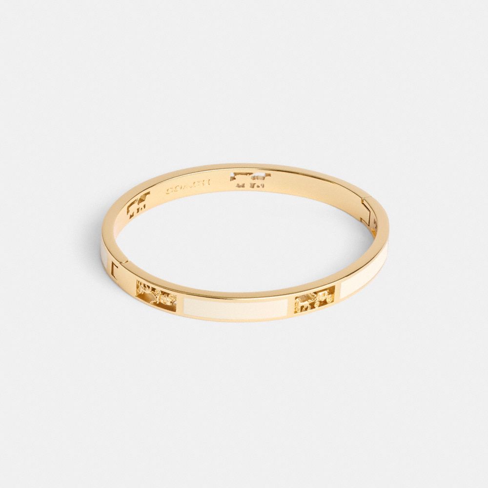 COACH HORSE AND CARRIAGE CUT OUT ENAMEL BANGLE 