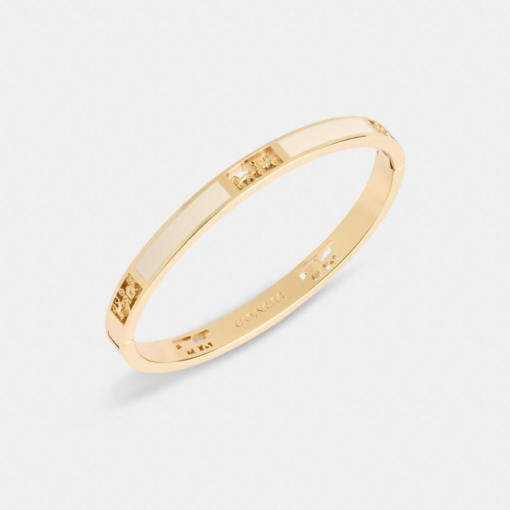 COACH HORSE AND CARRIAGE CUT OUT ENAMEL BANGLE 