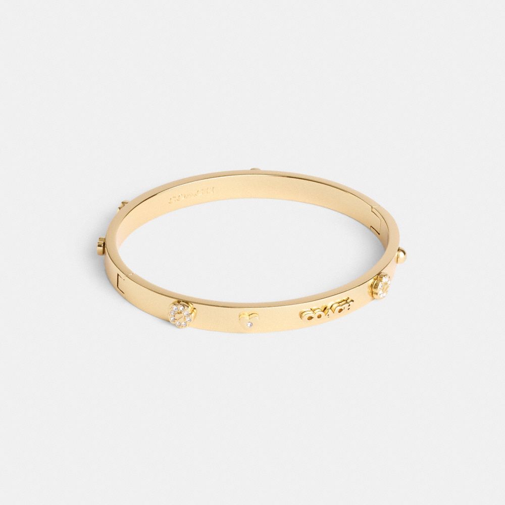 Coach Pegged Hinged Bangle In Gold
