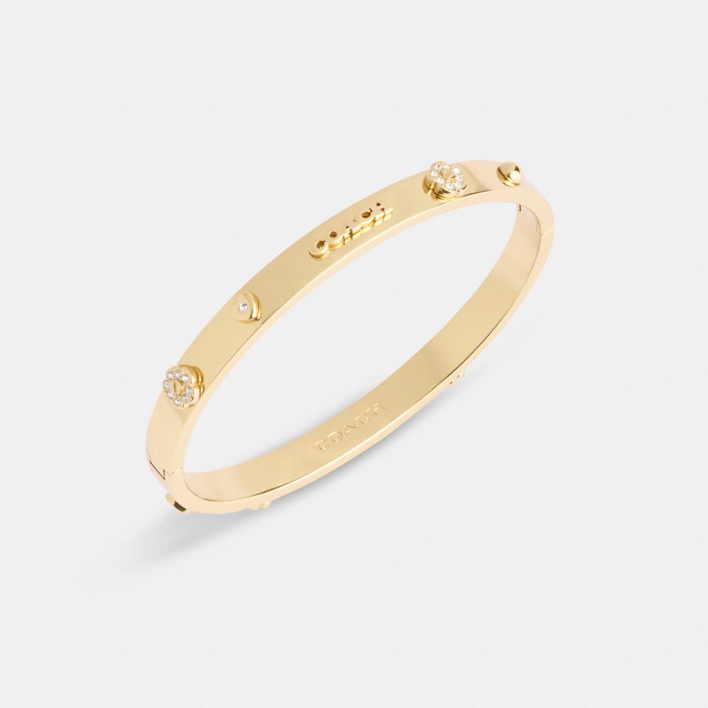 Coach Pegged Hinged Bangle In Gold