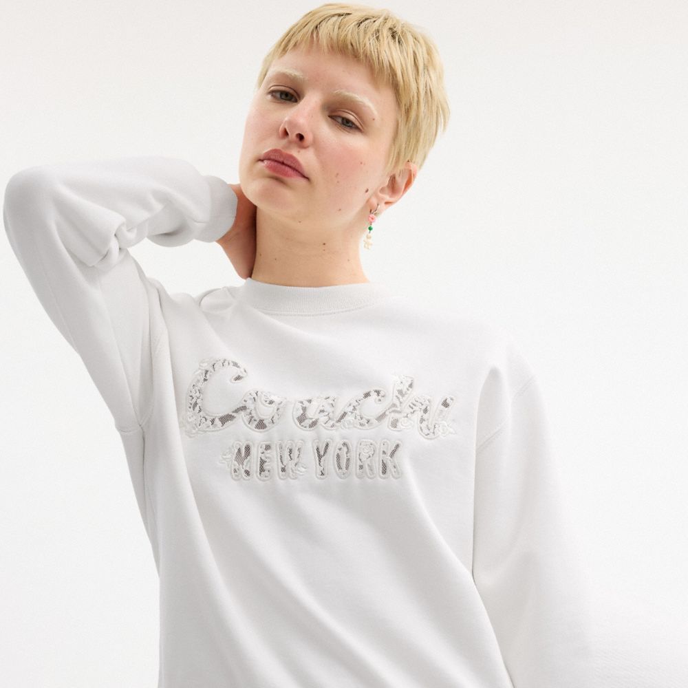 Shop Coach Cursive  Embroidered Sweatshirt In White