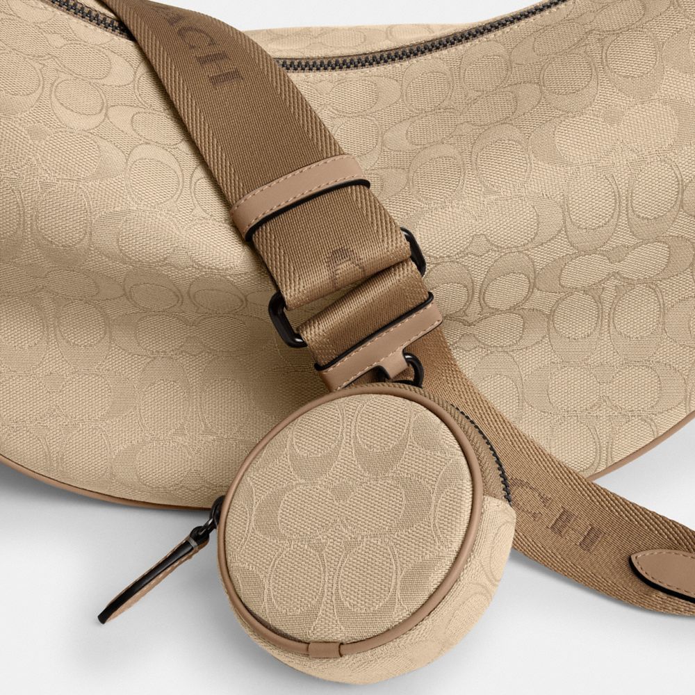 Coach Hall Soft Sling Bag 45 In Signature Jacquard