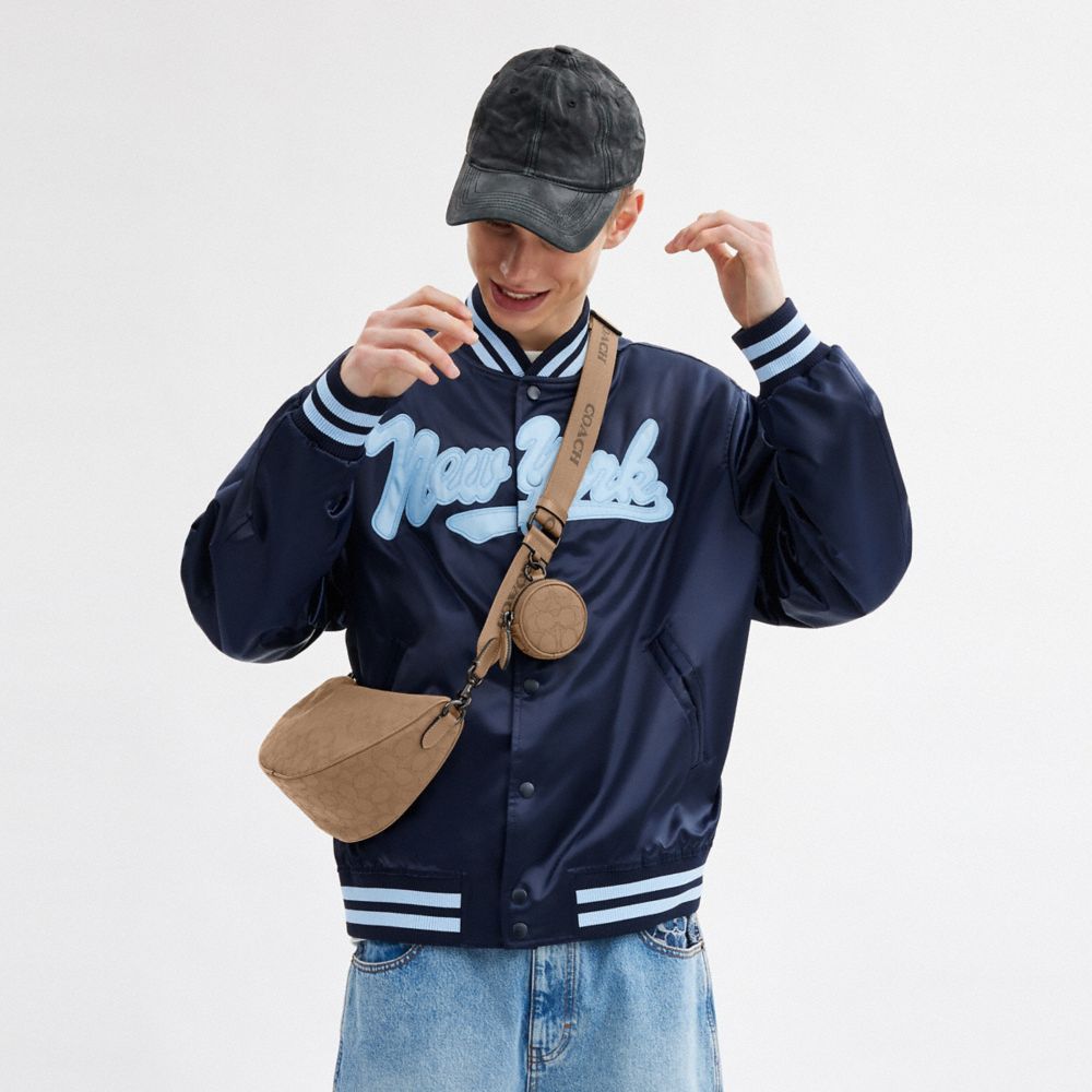 Coach Hall Soft Sling Bag In Signature Jacquard