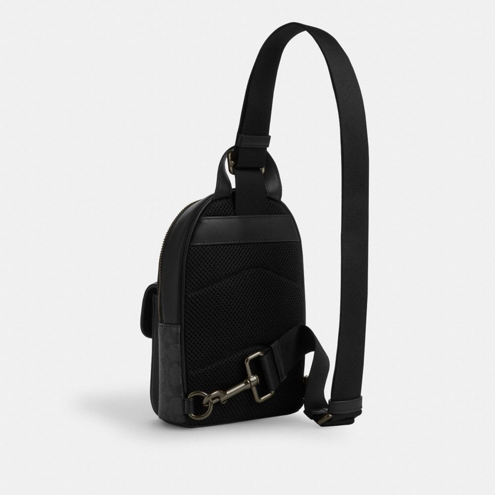 COACH®,Small Turnlock Sling Pack In Signature Canvas,,Angle View