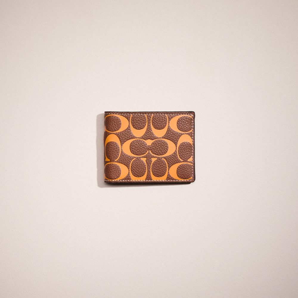 Coach Restored Slim Billfold Wallet In Signature Leather In Saddle/papaya