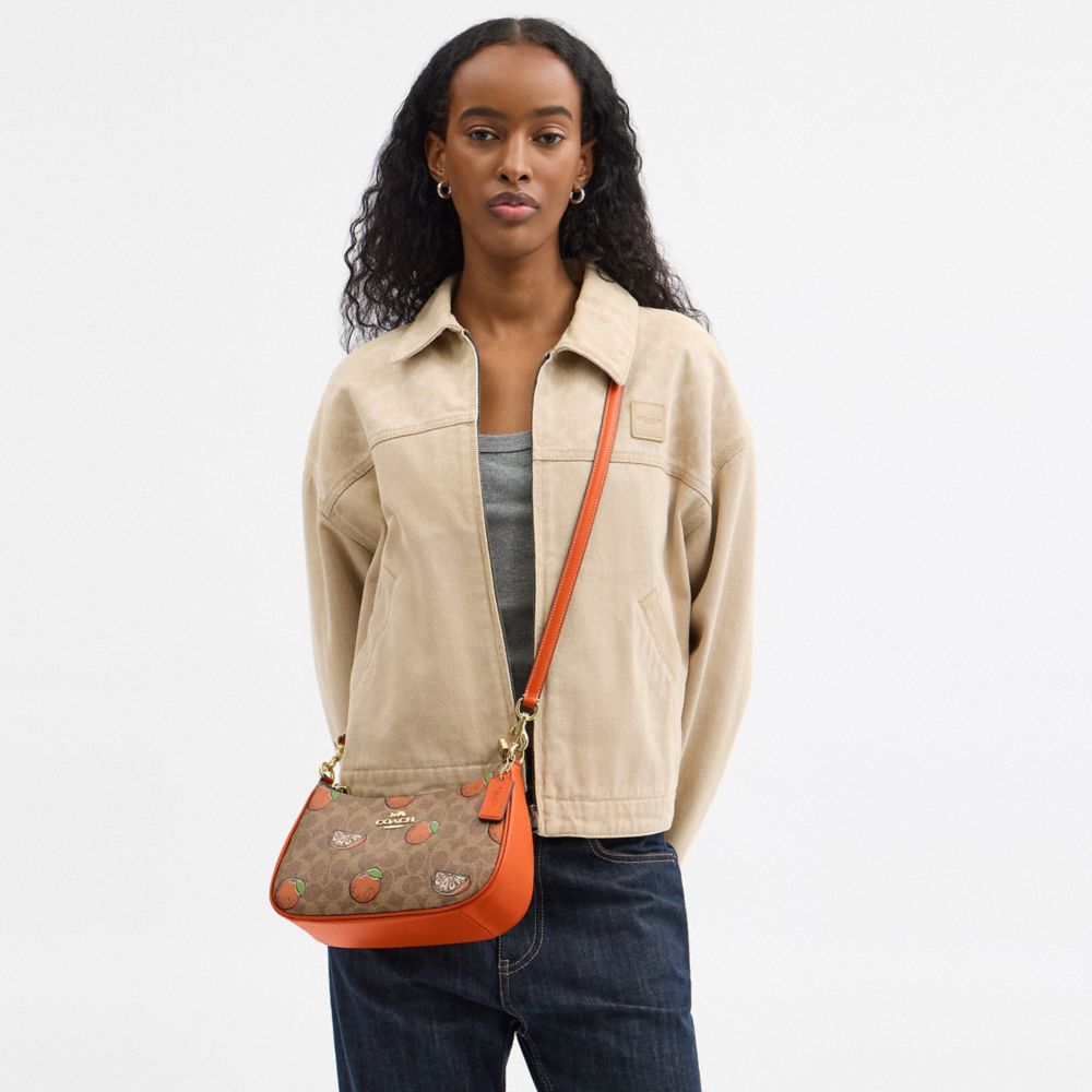 COACH®,Teri Shoulder Bag In Signature Canvas With Orange Print,