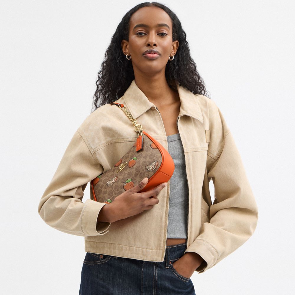 COACH®,Teri Shoulder Bag In Signature Canvas With Orange Print,,Detail View