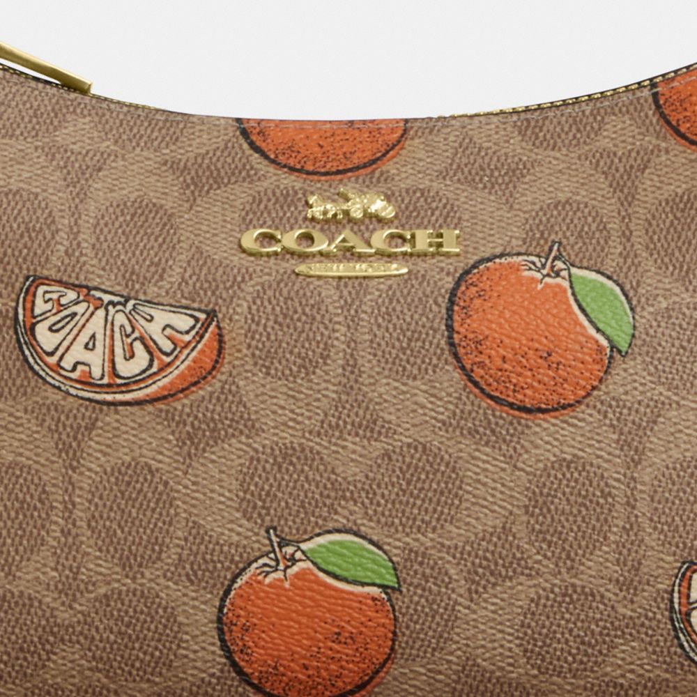 COACH®,Teri Shoulder Bag In Signature Canvas With Orange Print,,Closer View