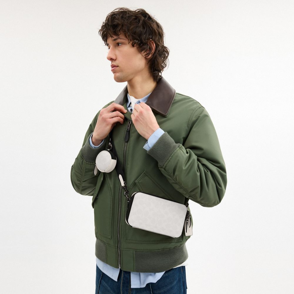 Coach Charter Slim Crossbody Bag In Signature Canvas In White/black Signature