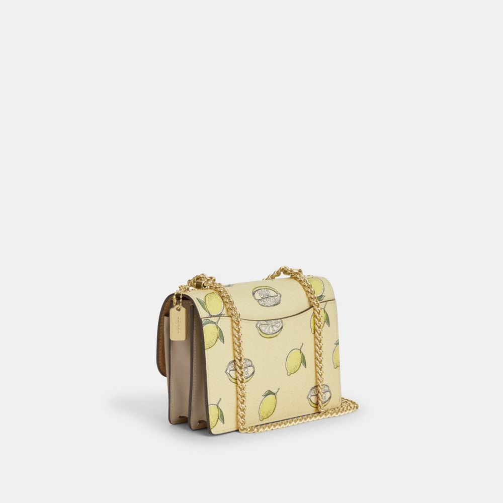 COACH®,Mini Klare Crossbody Bag With Lemon Print,,Angle View