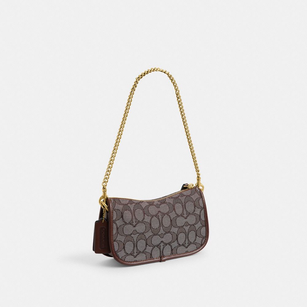 COACH®,Swinger Bag 20 In Signature Jacquard,,Angle View