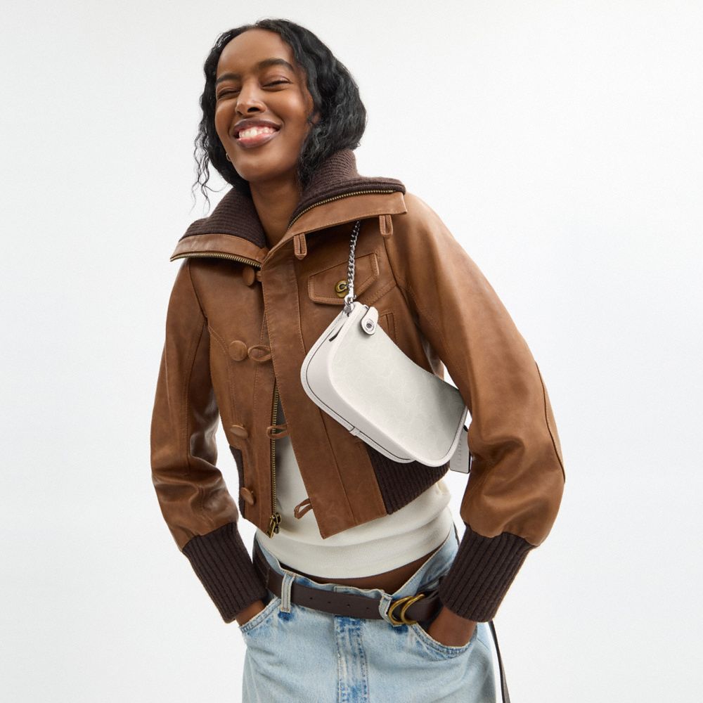 COACH®,Swinger Bag 20 In Signature Jacquard,Cotton,Recycled Polyester,Shoulder Bag,Piping,Brass,Casual,,Detail View