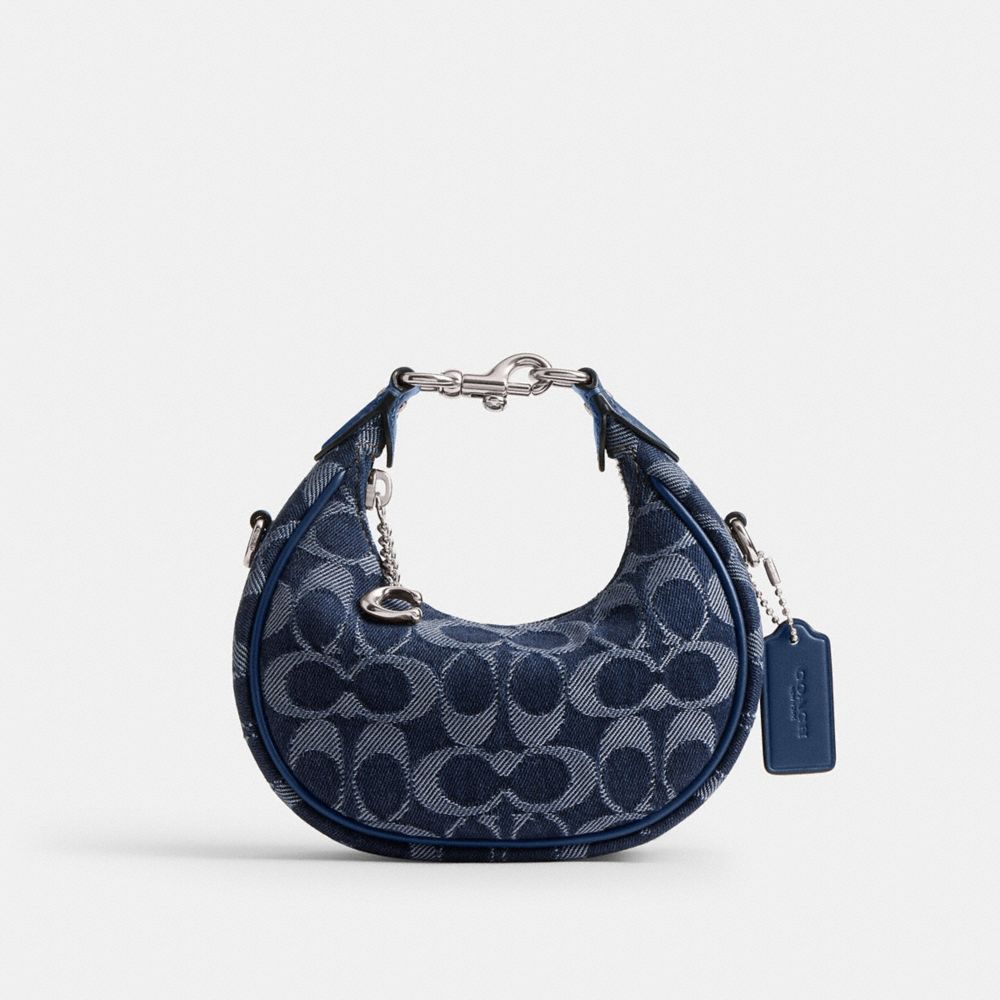 Shop Coach Jonie Bag In Signature Denim In Silver/deep Blue Multi