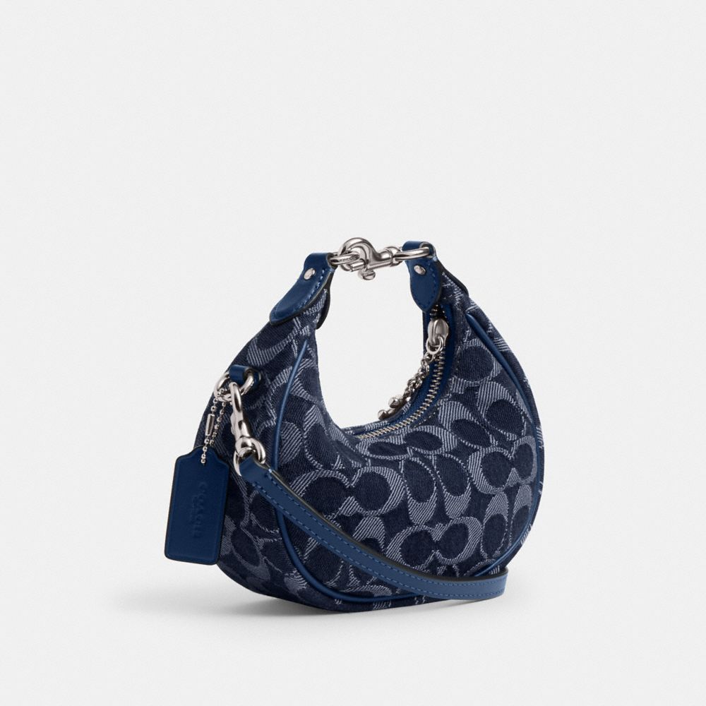 Shop Coach Jonie Bag In Signature Denim In Silver/deep Blue Multi