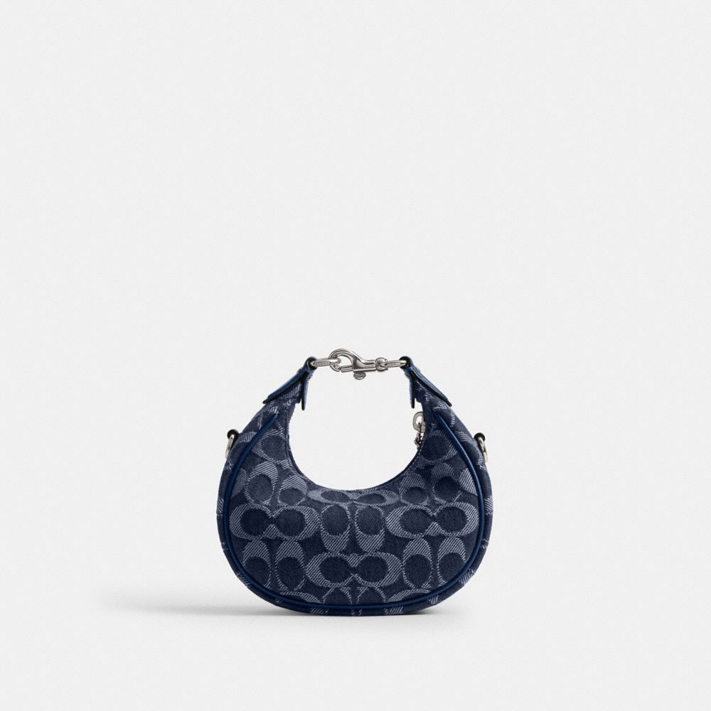 Shop Coach Jonie Bag In Signature Denim In Silver/deep Blue Multi