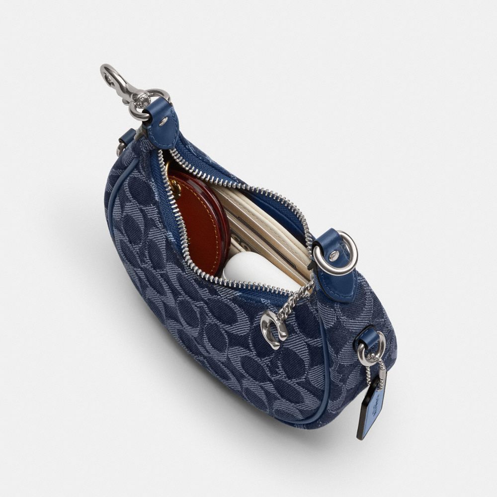 Shop Coach Jonie Bag In Signature Denim In Silver/deep Blue Multi