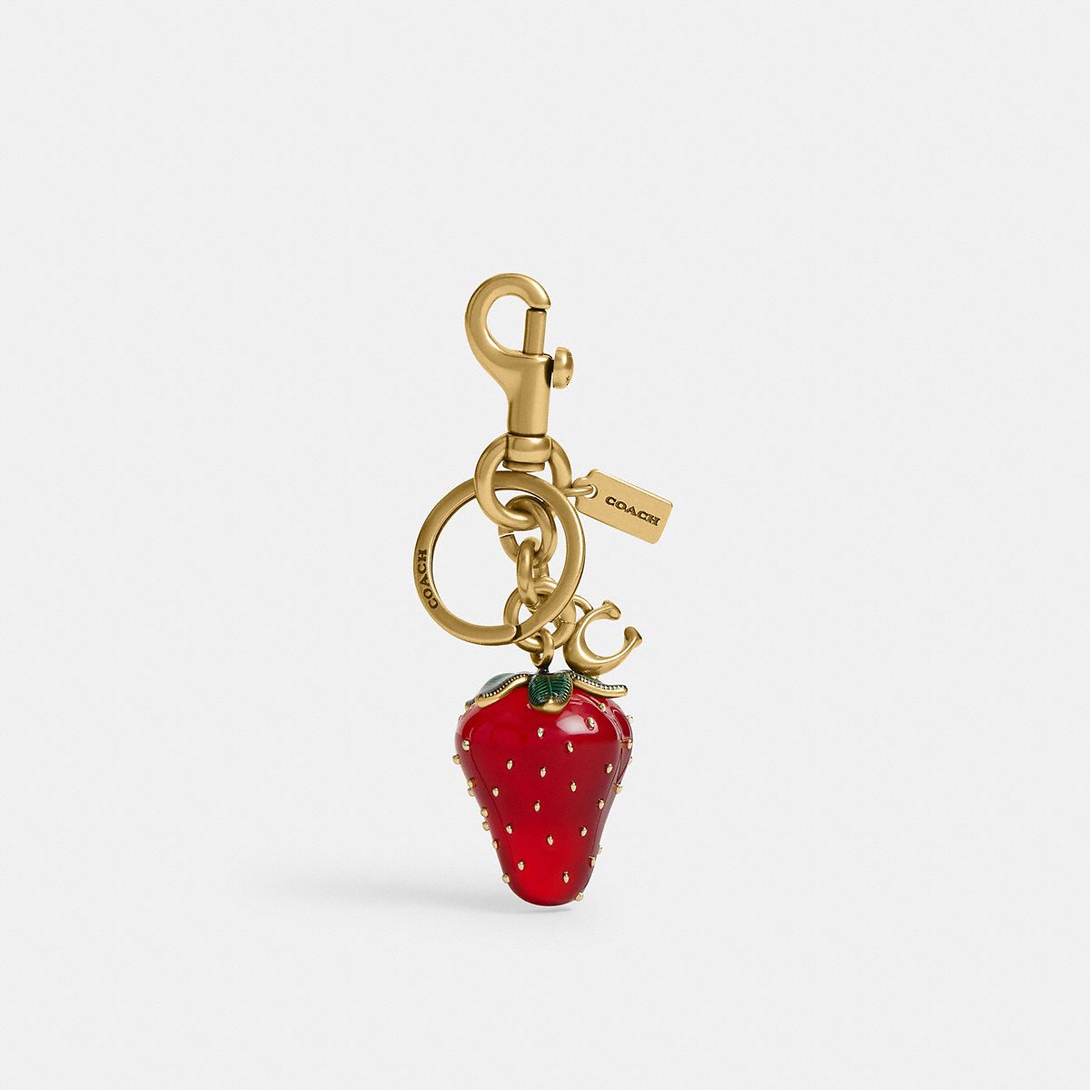 Coach red resin strawberry bag charm with gold clip