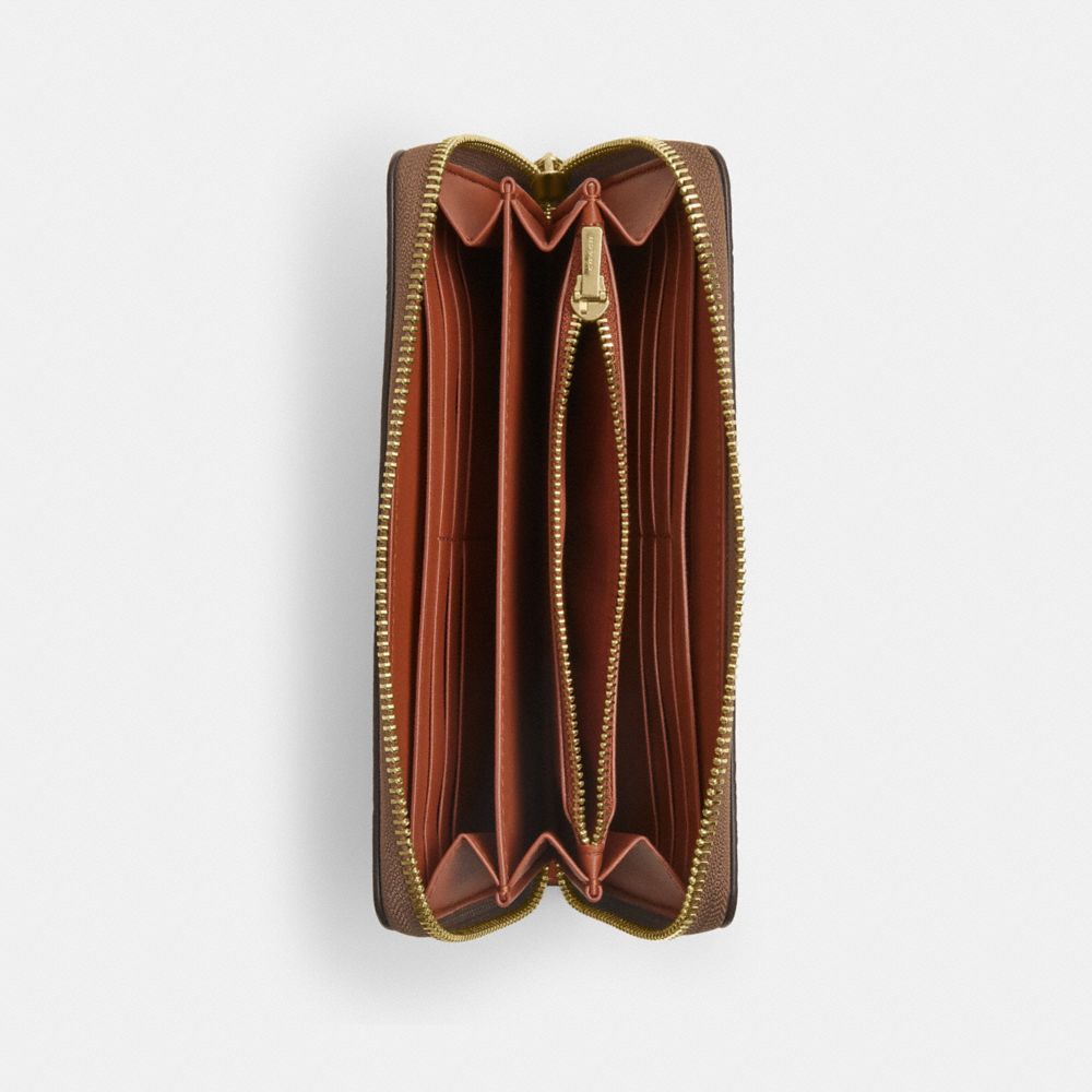 COACH®,Long Zip Around Wallet In Signature Canvas With Orange Print,,Inside View,Top View