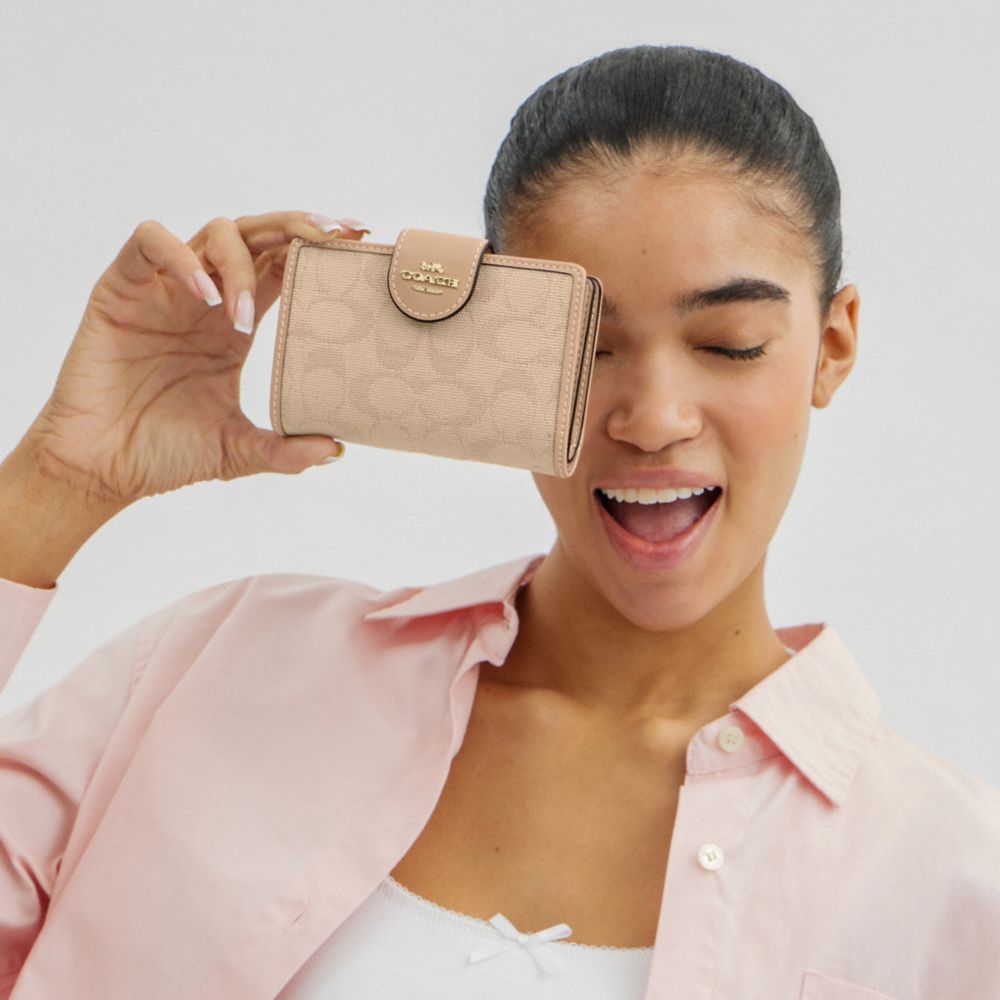 COACH®,Medium Corner Zip Wallet With Signature Canvas,Beige,Detail View