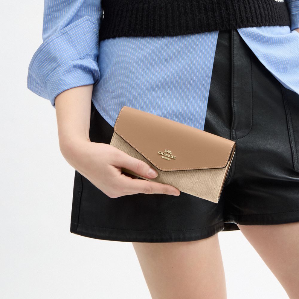 COACH®,エンベロープ ウォレット・シグネチャー キャンバス,ﾀﾞｰｸ ﾅﾁｭﾗﾙ ﾏﾙﾁ