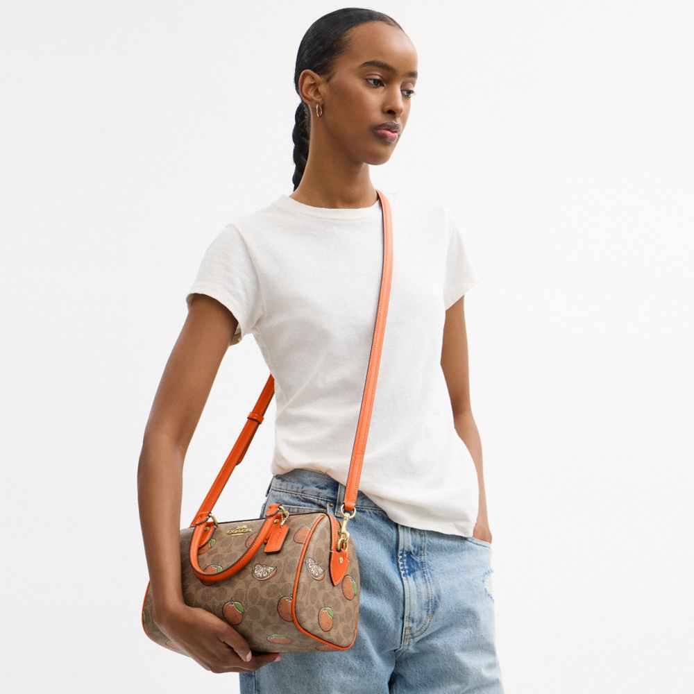 COACH®,Rowan Satchel Bag In Signature Canvas With Orange Print,