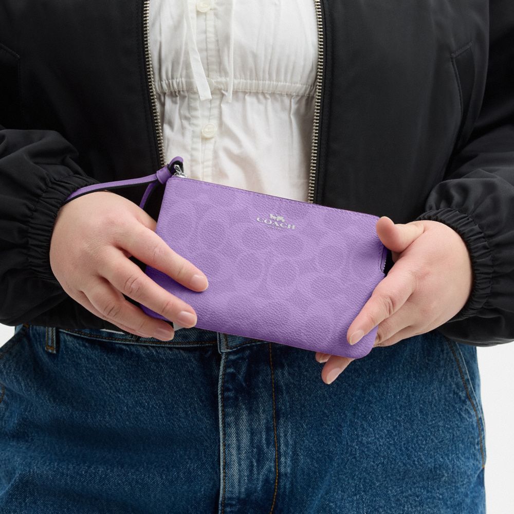 COACH®,Corner Zip Wristlet In Signature Canvas,Wristlet,Pouch,Plastic,Casual,Lavender,Detail View