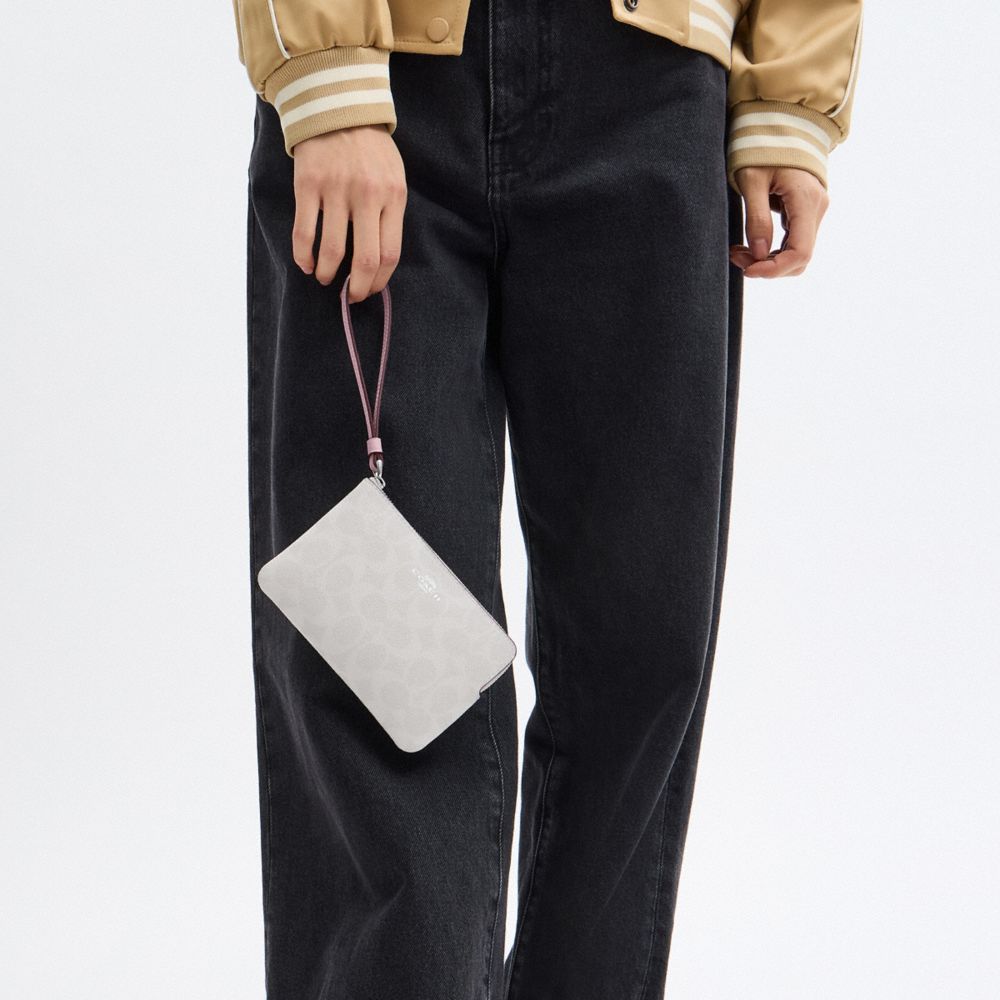COACH®,Corner Zip Wristlet In Signature Canvas,Wristlet,Pouch,Plastic,Casual,White,Detail View