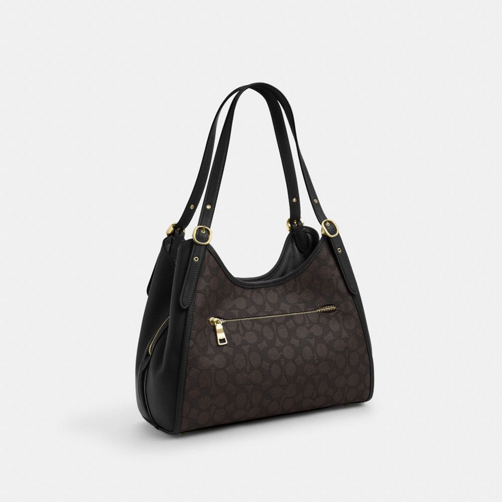 COACH®,Erin Shoulder Bag In Signature Canvas,,Angle View