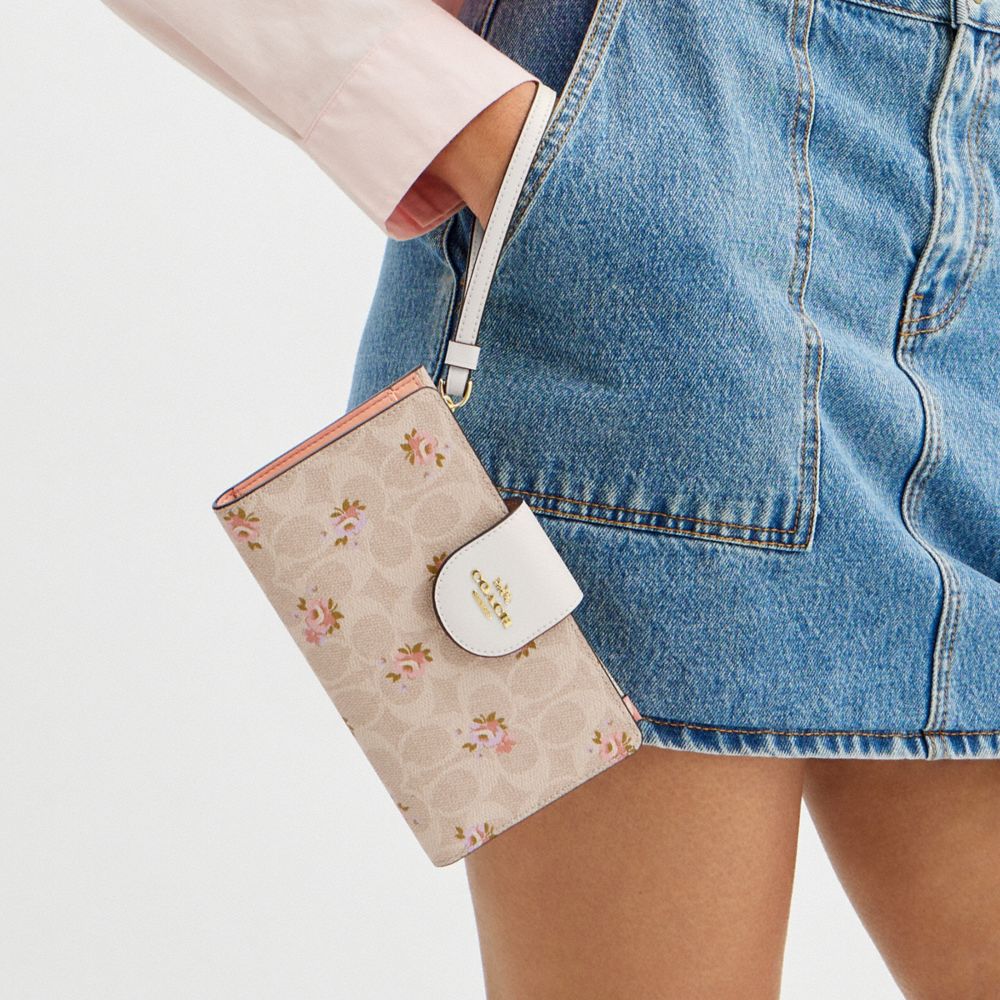 COACH®,Phone Wallet In Signature Canvas With Floral Print,Beige,Detail View