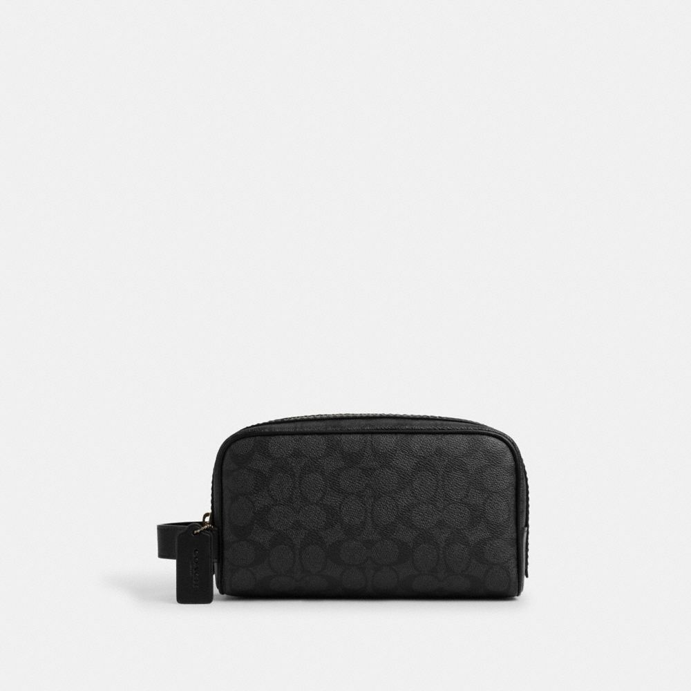 COACH®,Small Travel Kit In Signature Canvas,Black,Front View image number 0