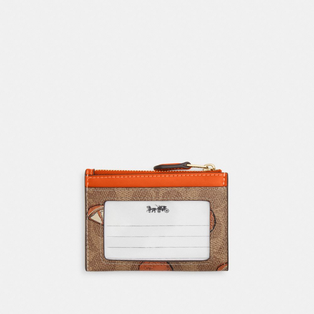 COACH®,Mini Skinny Id Case In Signature Canvas With Orange Print,,Back View