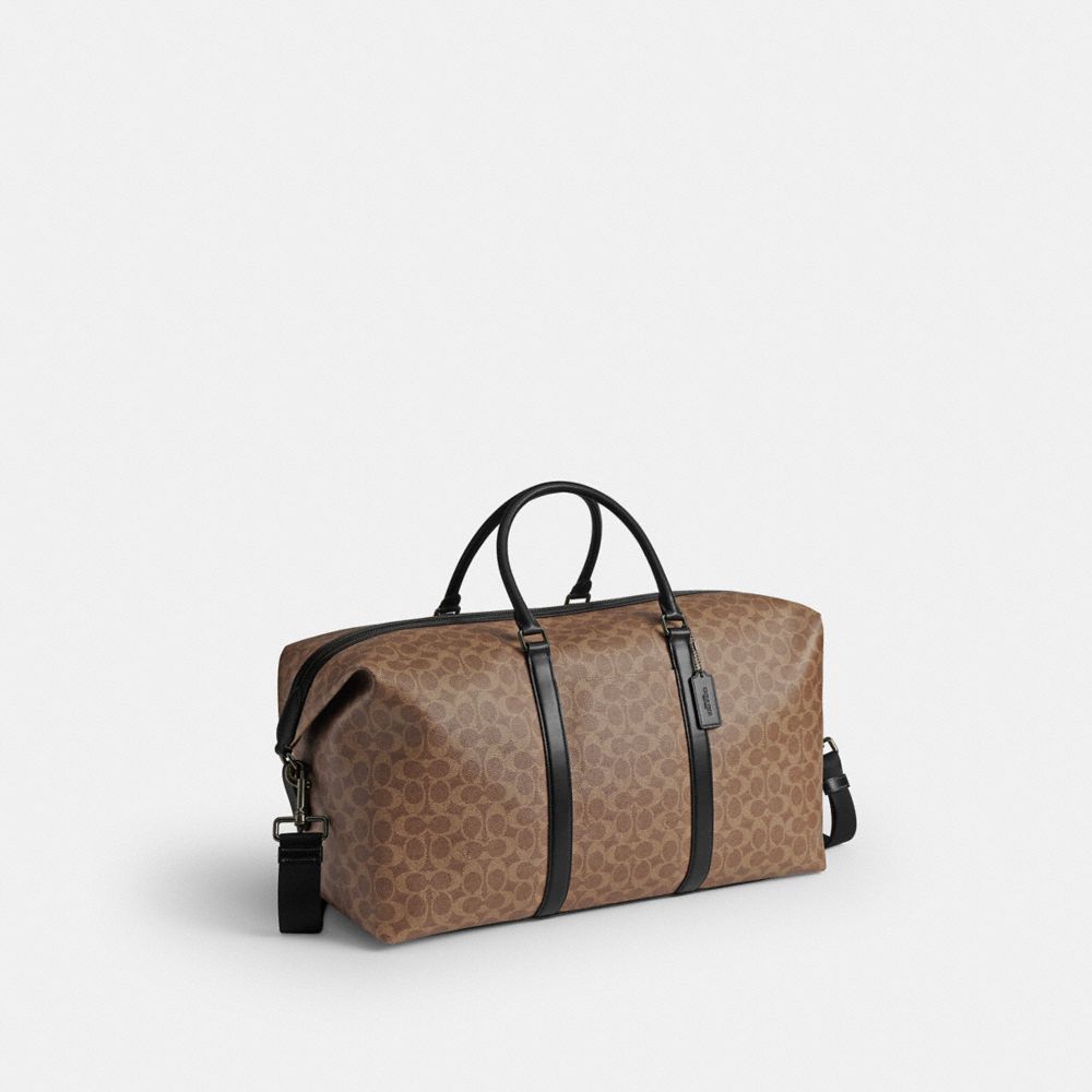 COACH®,Trekker Bag 52 In Signature Canvas,Leather,Canvas,Duffle Bag,Fabric,Logo,,Angle View