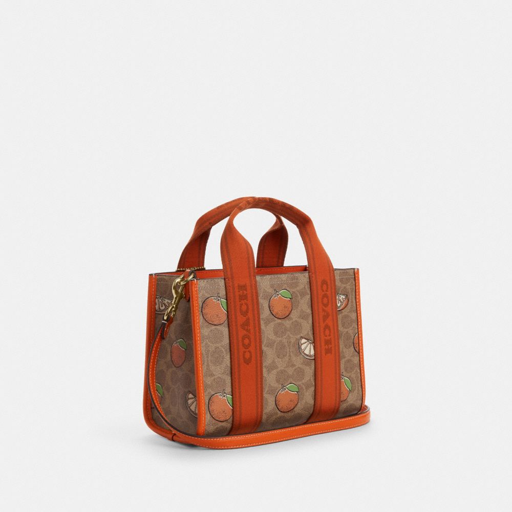 COACH®,Smith Tote Bag 24 In Signature Canvas With Orange Print,,Angle View