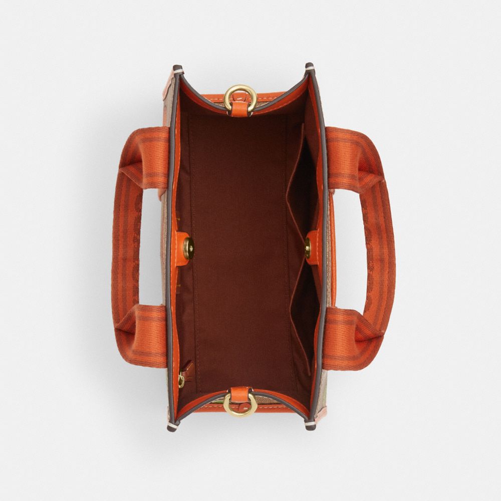 COACH®,Smith Tote Bag 24 In Signature Canvas With Orange Print,,Inside View,Top View