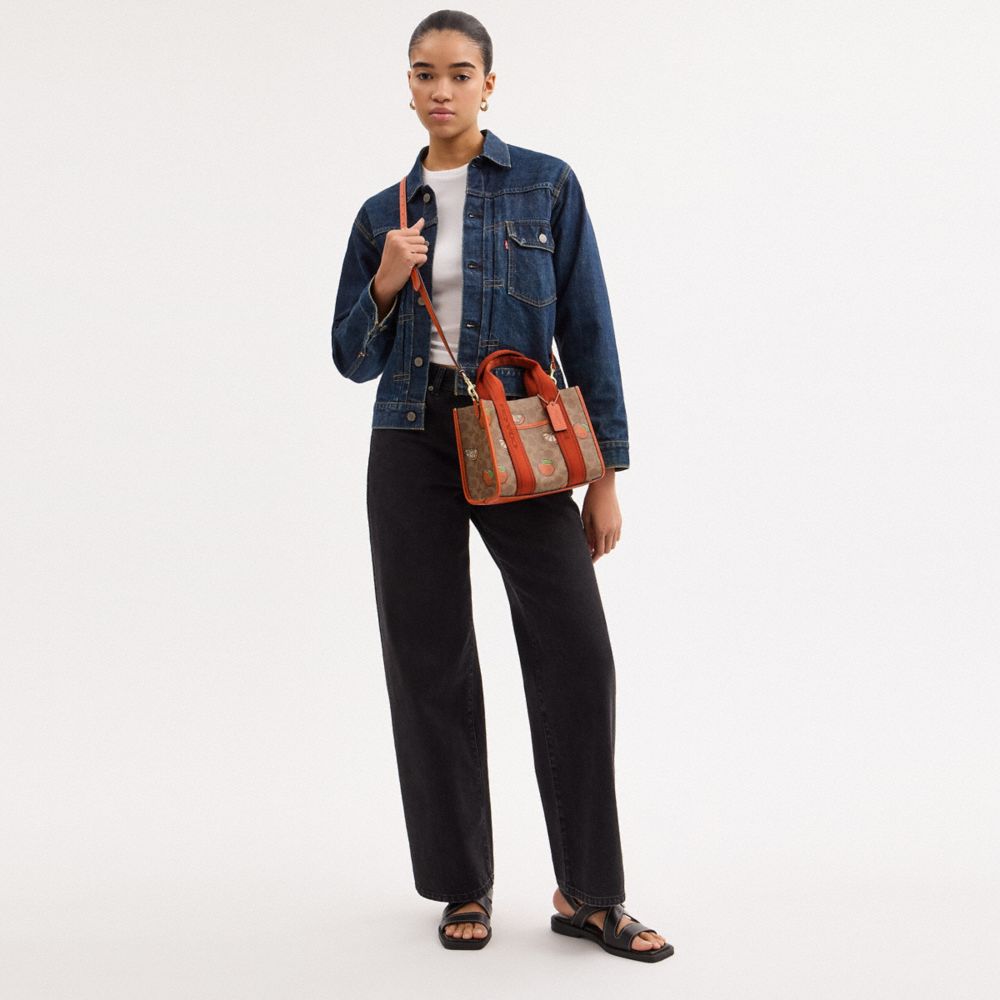 COACH®,Smith Tote Bag 24 In Signature Canvas With Orange Print,,Detail View