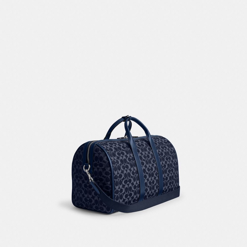 COACH®,Gotham Duffle Bag 45 In Signature Denim,,Angle View