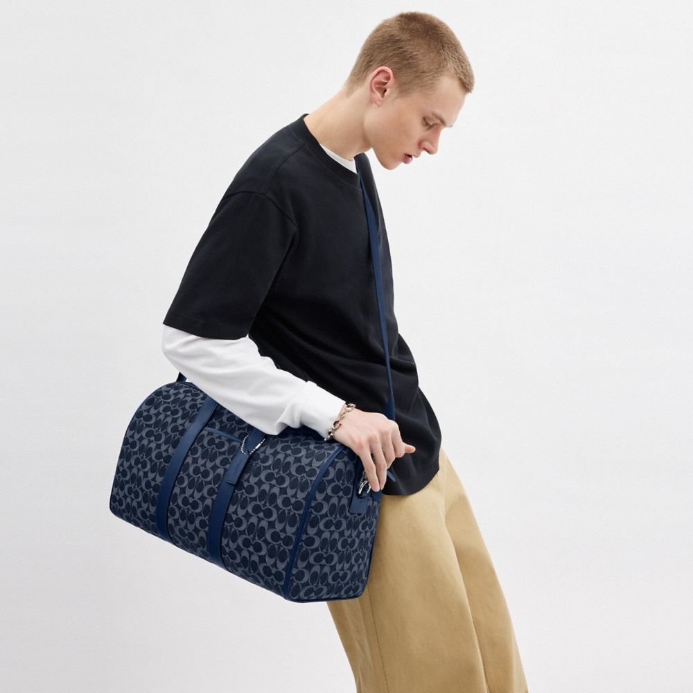 COACH®,Gotham Duffle Bag 45 In Signature Denim,Cotton,Leather,Duffle Bag,ID Tag,Blue,Detail View