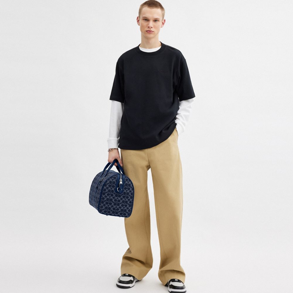 COACH®,Gotham Duffle Bag 45 In Signature Denim,Cotton,Leather,Duffle Bag,ID Tag,Blue,Detail View