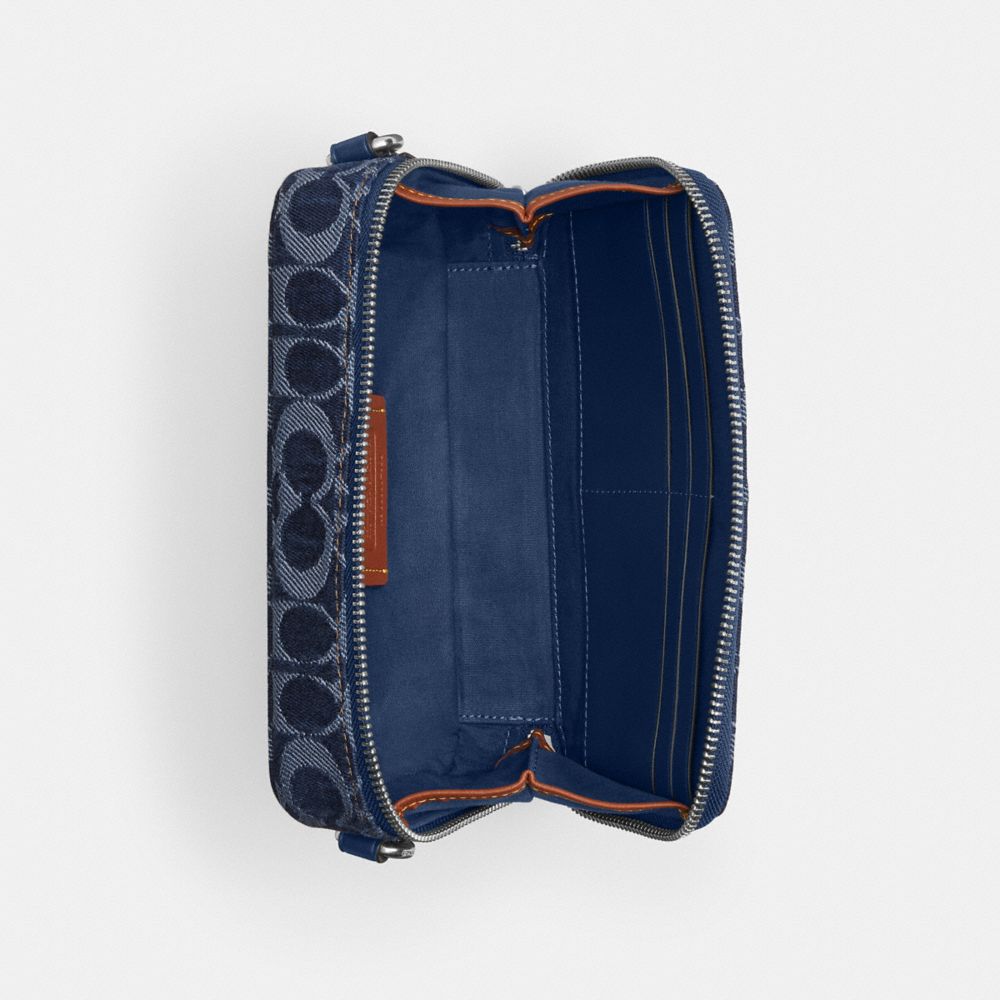 COACH®,Charter Slim Crossbody Bag In Signature Denim,Navy,Inside View,Top View