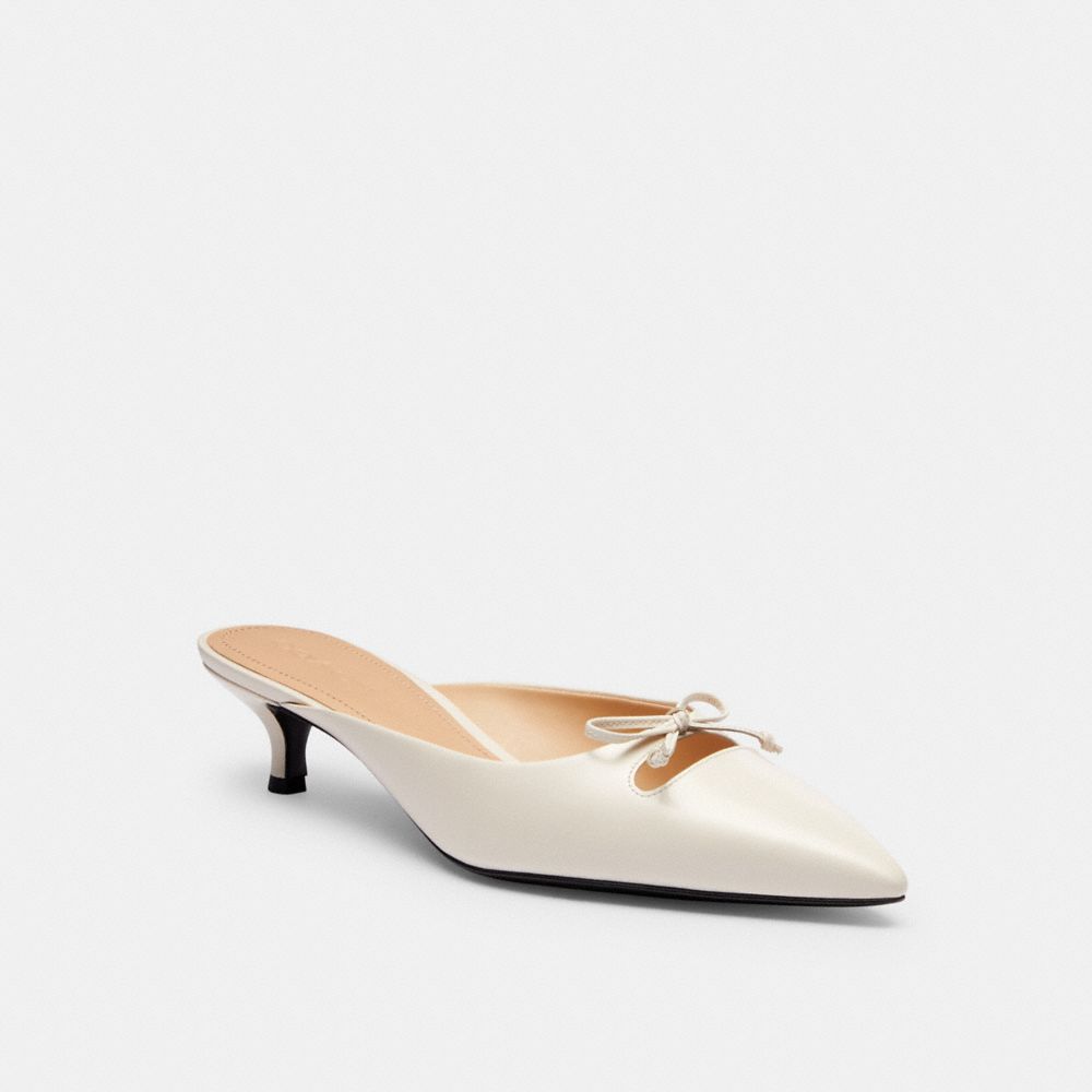 Coach Mules In White