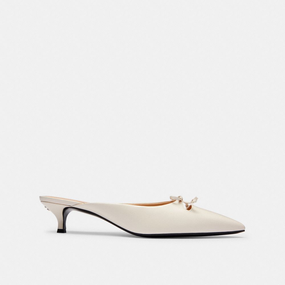 Coach Mules In White