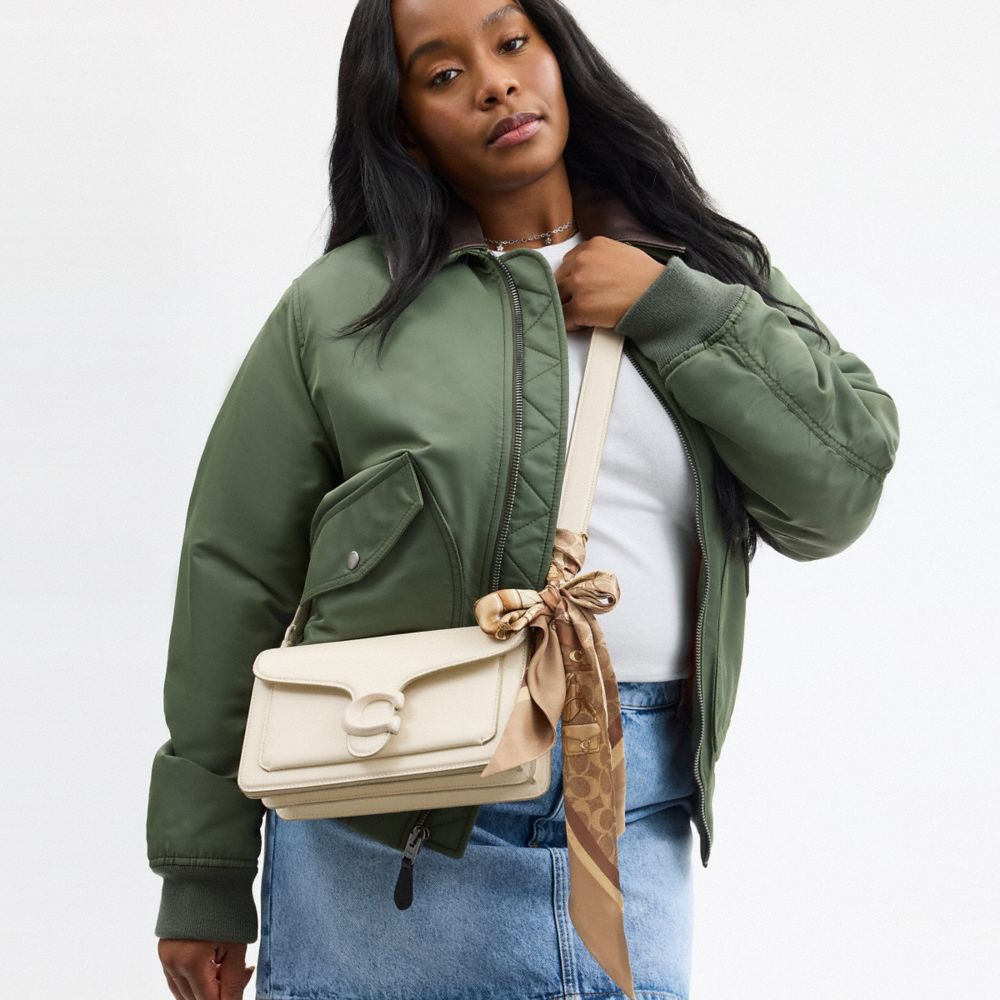 Coach In Tan