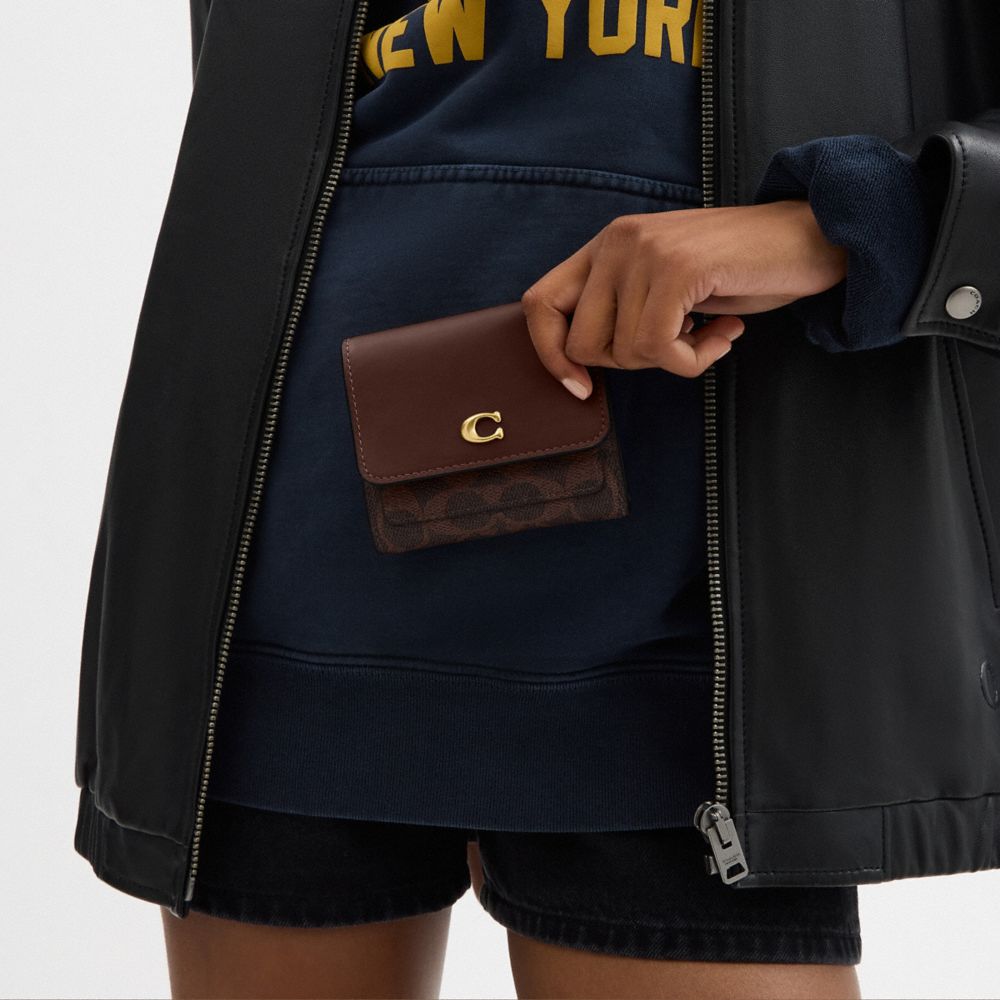 Coach Mila Small Flap Wallet In Signature Canvas In Brown