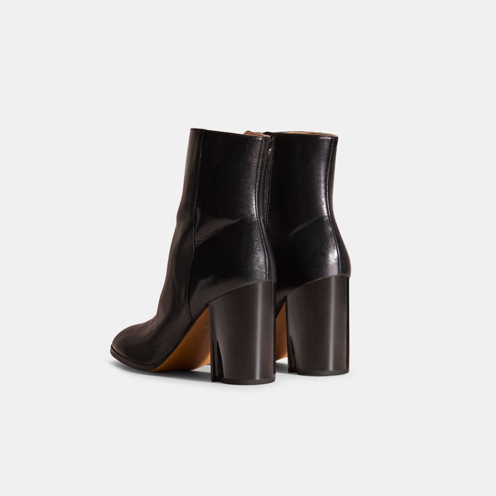 COACH®,Restored Brielle Bootie,Rubber,Leather,Bootie,Pull Tab,Sustainable,Day Party,Black,Back View